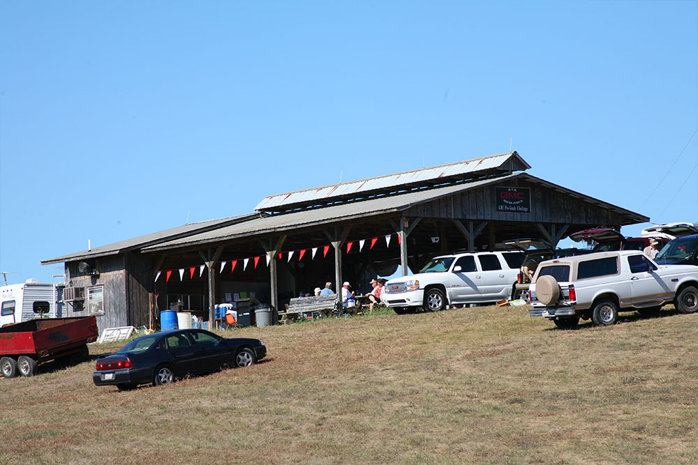 The large covered pavilion with trucks parked out front