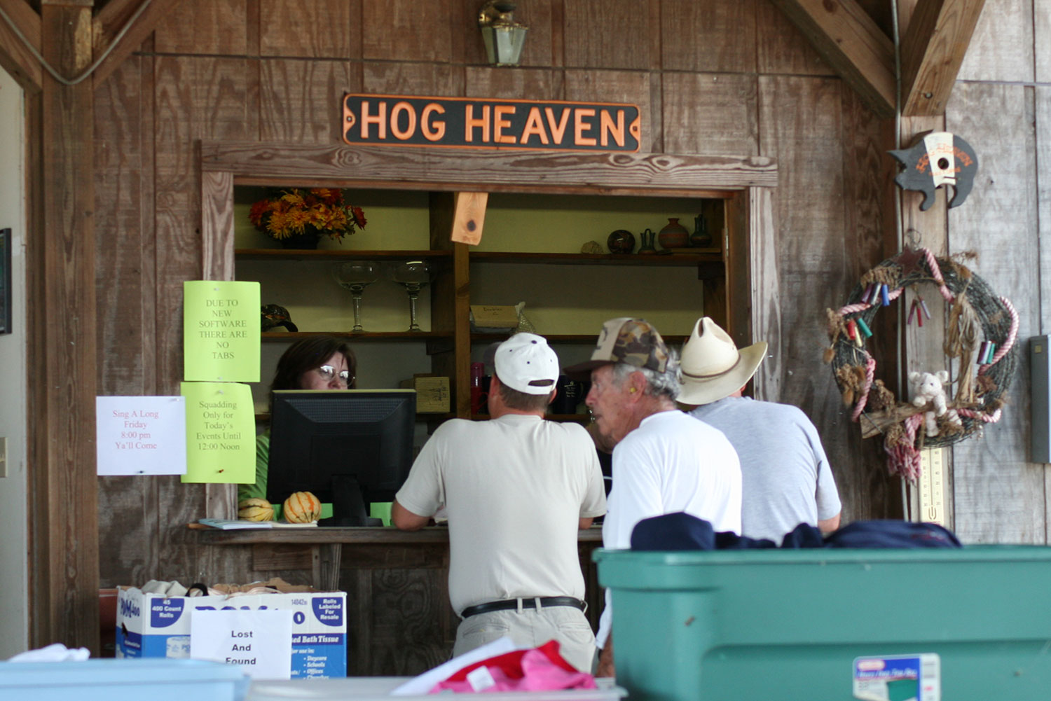 Shooters at the Hog Heaven registration window